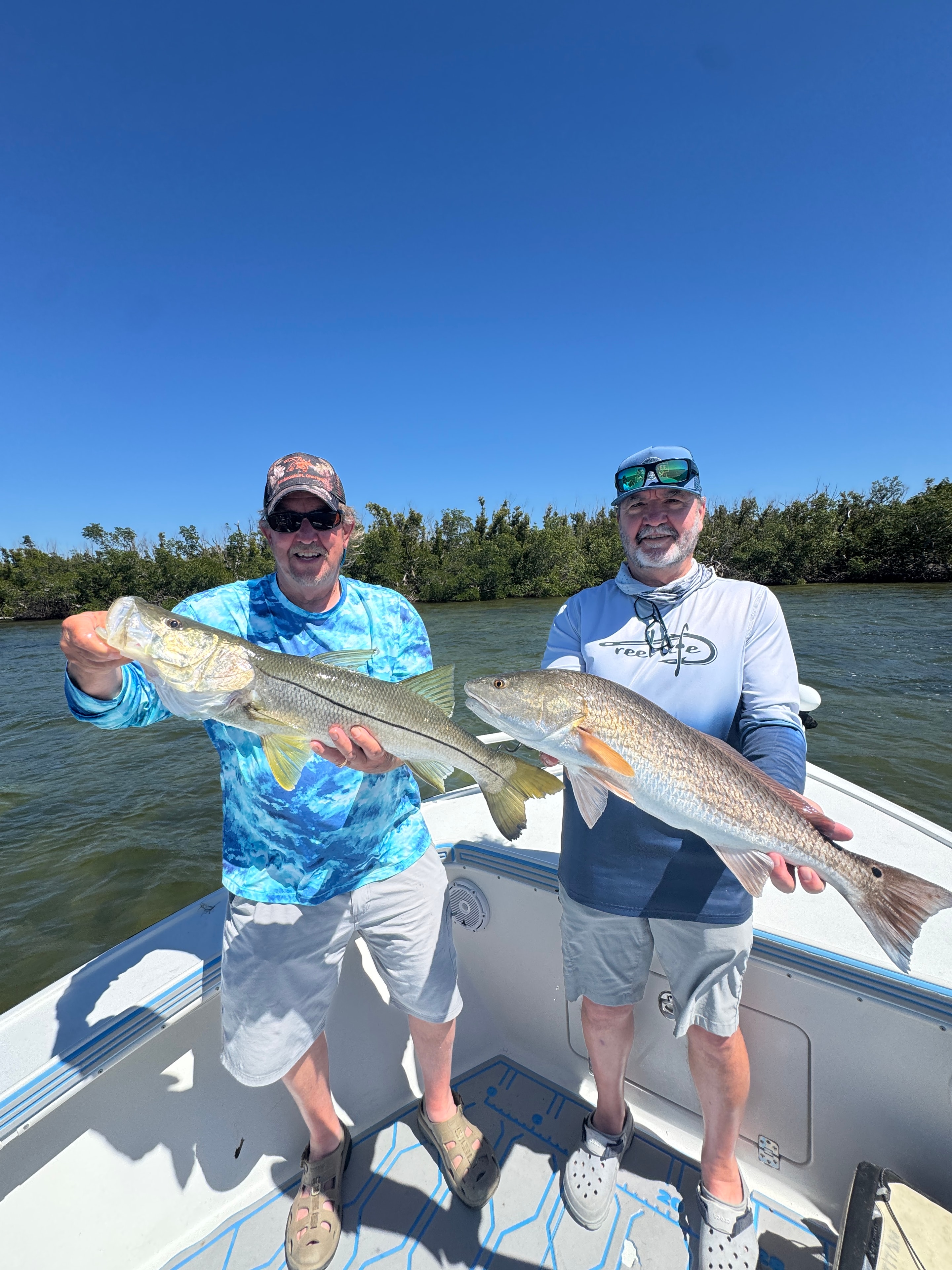 SWFL inshore fishing guide with client catch